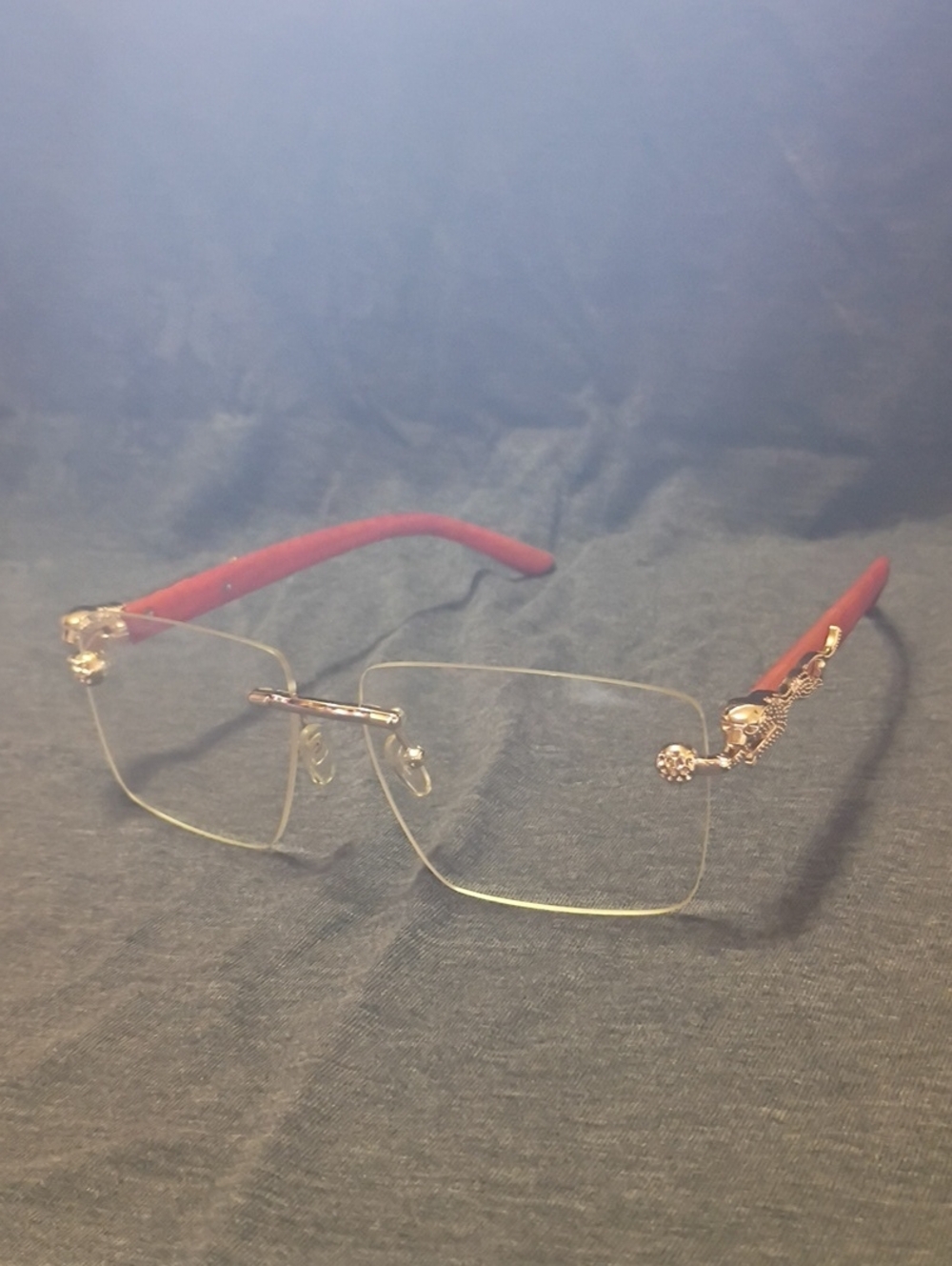 Cartier Rimless Women's Glasses with Red Temples and Gold Accents